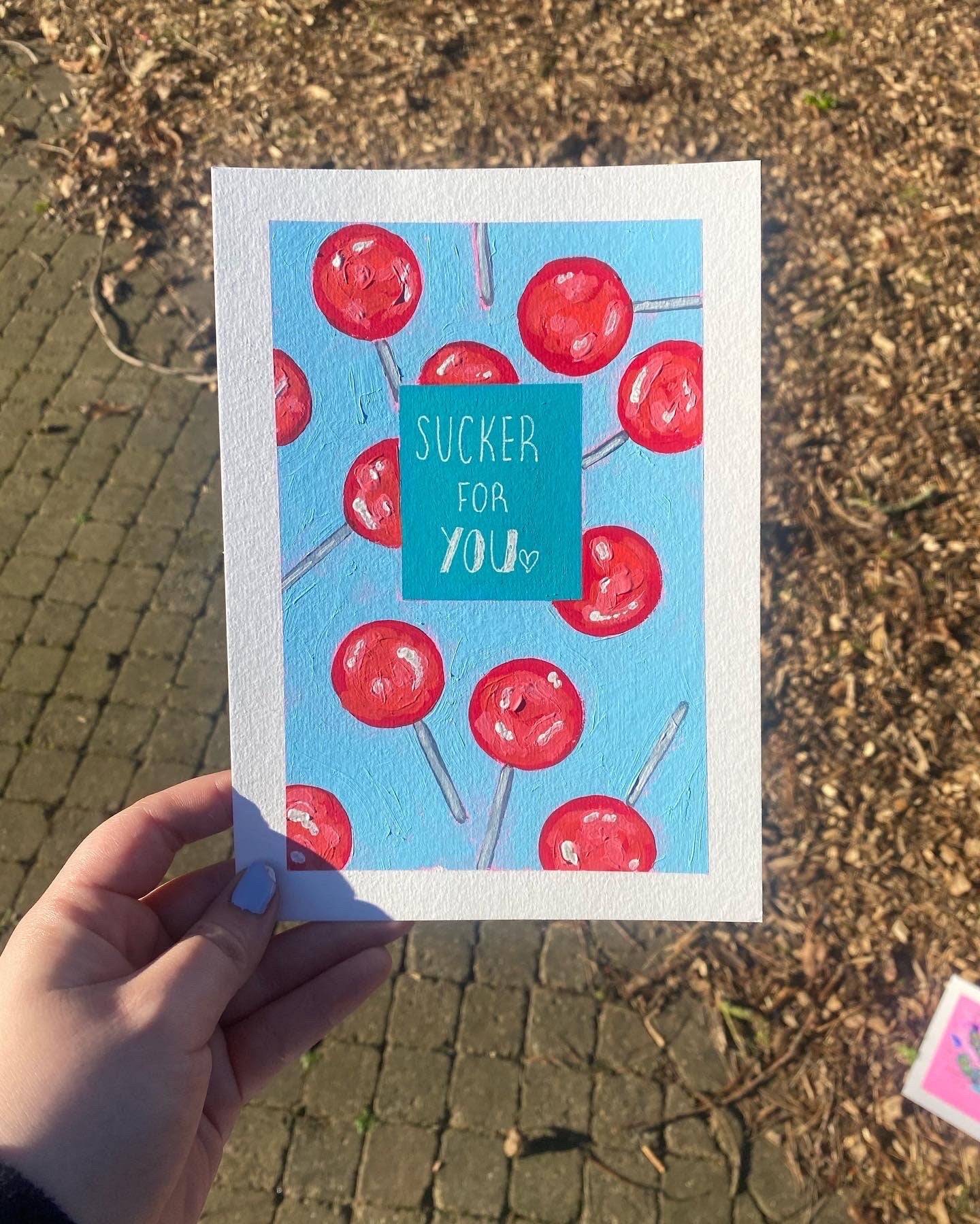 Mini lollipop painting, sucker for you, acrylic on A5 paper with border.